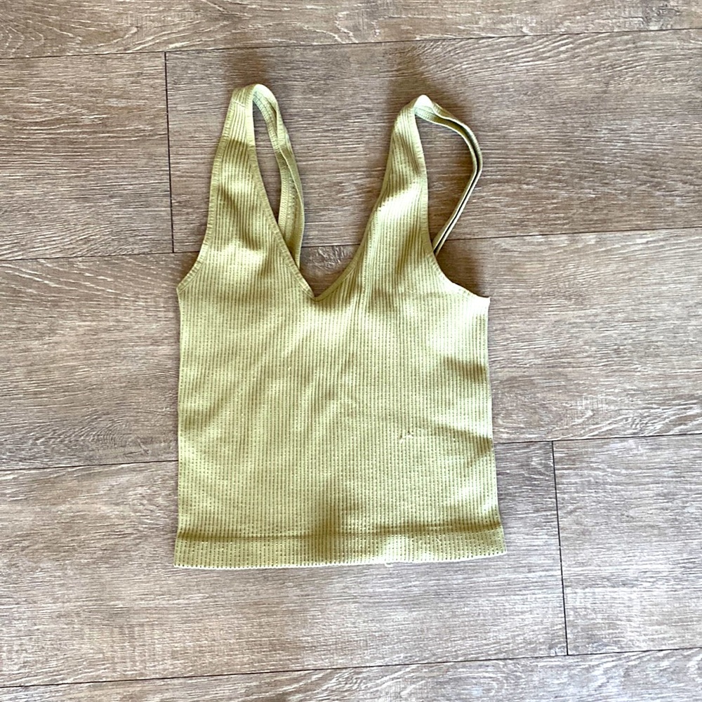 Green tank top. Longer fit/ full length.